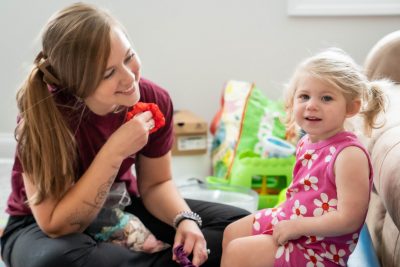 Megan Price works with a child with a CASK mutation
